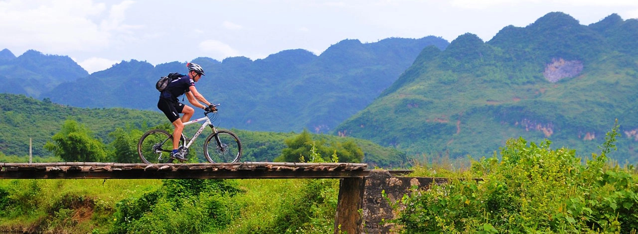 Vietnam Laos Mountain Bike Tour: Conquering the High Peaks of Indochina